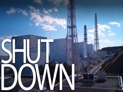 Shut down text with company on background