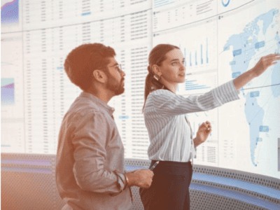 man and woman tracking on screen